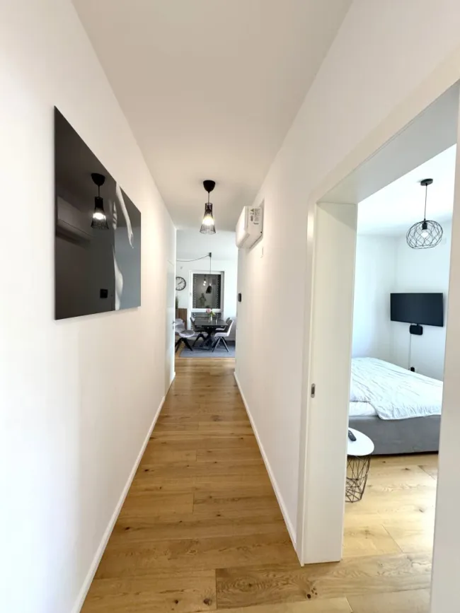Exklusive 3,5-Zimmer-Gartenwohnung mit direktem Naturteich-Zugang und Süd-West-Loggia in Unterpremstätten bei Graz - Bild