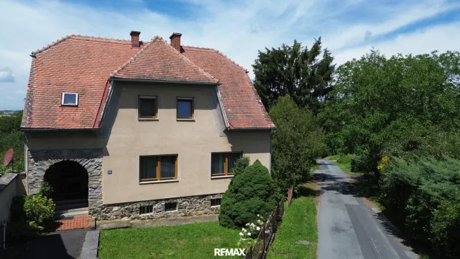 Großzügiges Einfamilienhaus mit 7 Zimmern, Garage und traumhaftem Garten in St. Michael im Burgenland - Bild