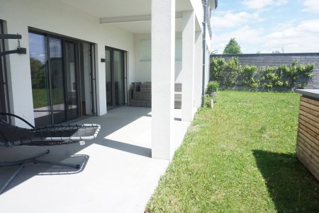 Gartenwohnung mit überdachter Terrasse / Top 2