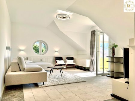 Stylisches Design-Apartment mit Balkon und Wörthersee-Blick – Wohnen, wo andere Urlaub machen
