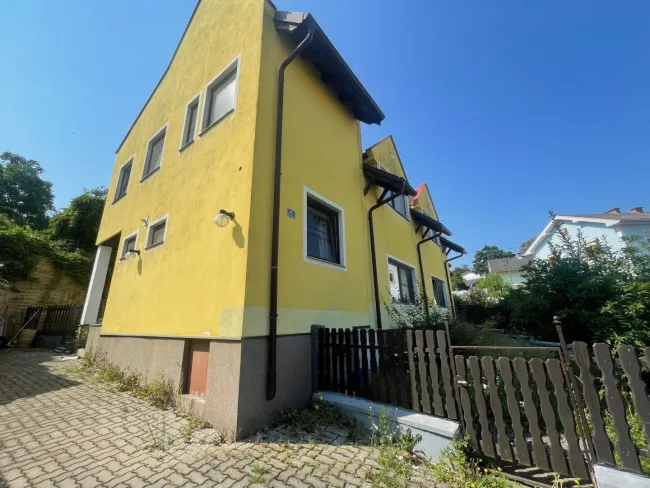 Kleiner Preis: Wohnungseigentum mit Gartennutzung! - Titelbild