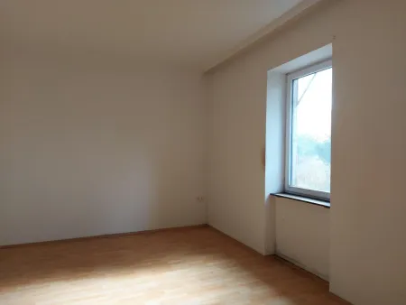 Eines der Zimmer im OG