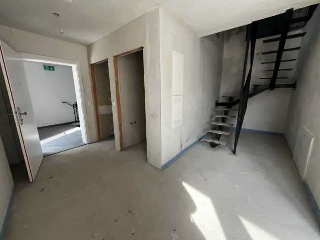 Obersdorf Living - Erstbezug: 131m² Maisonette Loft - Wohnen mit beeindruckendem XL Wohnbereich - Bild