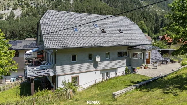 chaletartige Wohnung mit riesigem Garten, beinahe ein ganzes Haus - Titelbild