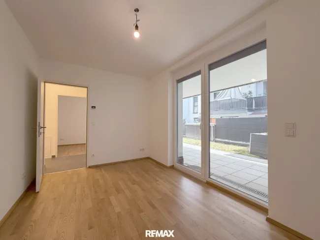 Moderne Gartenwohnung mit großzügiger Terrasse - Bild