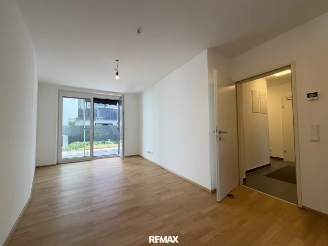 Moderne Gartenwohnung mit großzügiger Terrasse - Bild