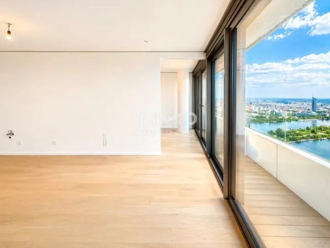 DANUBEFLATS: Smarter 2 Zimmer Grundriss - Pool, Sauna, Fitness, Concierge inklusive - Titelbild