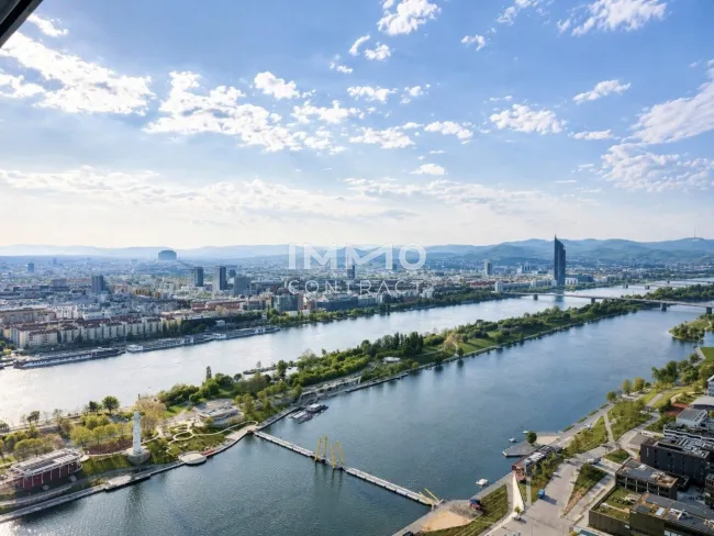 DANUBEFLATS: 41. Etage - Wo die City und die Wiener Hausberge zu Füßen liegen – Erstbezug - Titelbild