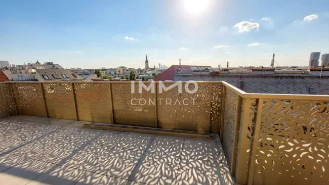 Exklusive und energiesparende Dachterrassenwohnung mit sensationell hohen Decken! - Titelbild