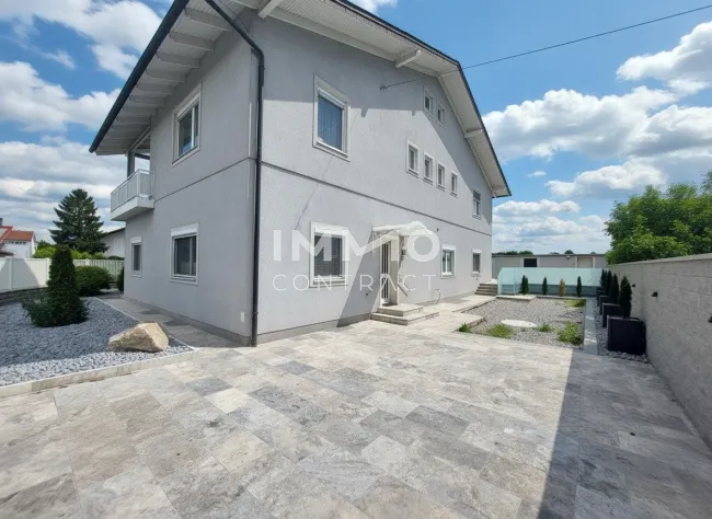 Flexibel nutzbares Wohhhaus mit getrennten Eingängen - ideal für große Familien oder Wohnung & Arbeiten - Titelbild