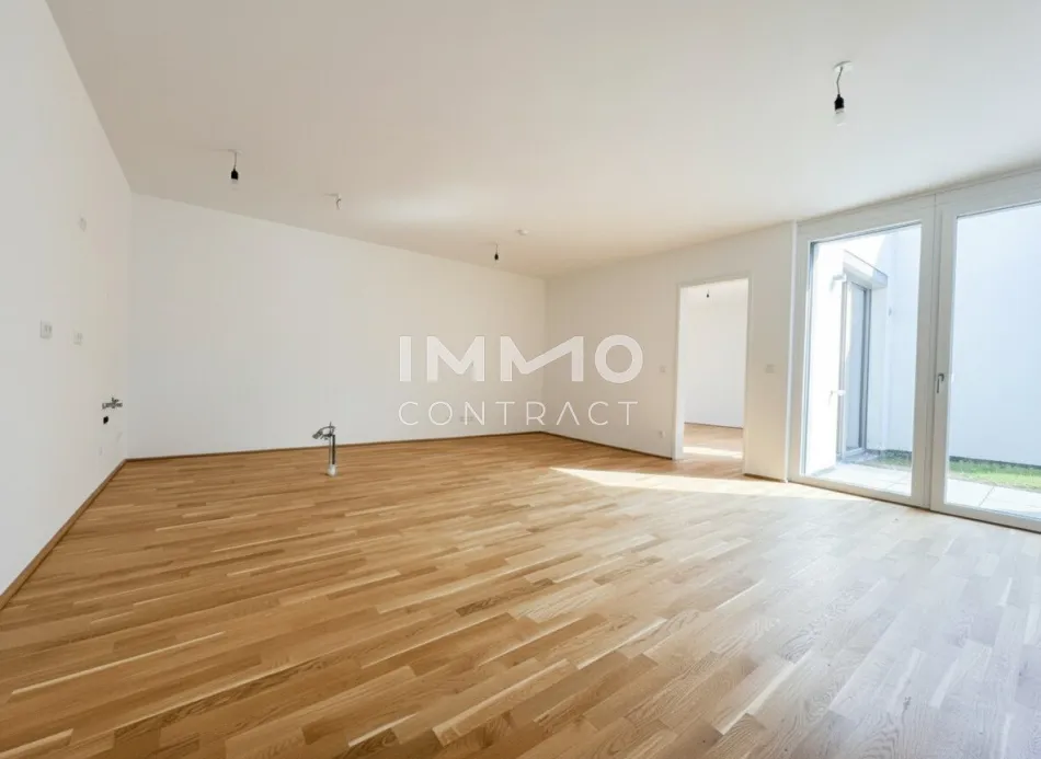 Großzügige Gartenwohnung mit sonniger Terrasse & zwei Bädern – Erstbezug BEIM DONAUUFER - Bild