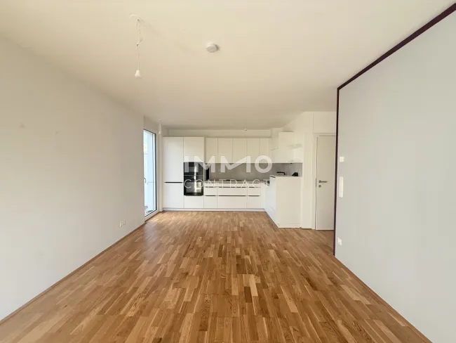 EDI N° 7 - 3-Zimmer-Erdgeschosswohnung | Loggia | 184 m² Eigengarten | Großzügige Räume | Naturblick - Bild