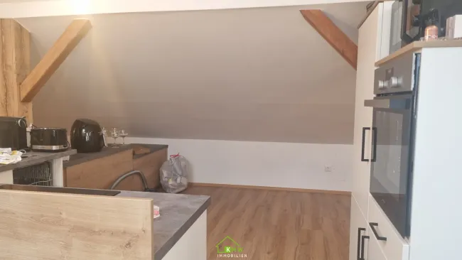 3-Zimmer-Dachgeschoßwohnung in zentraler Ruhelage - Bild