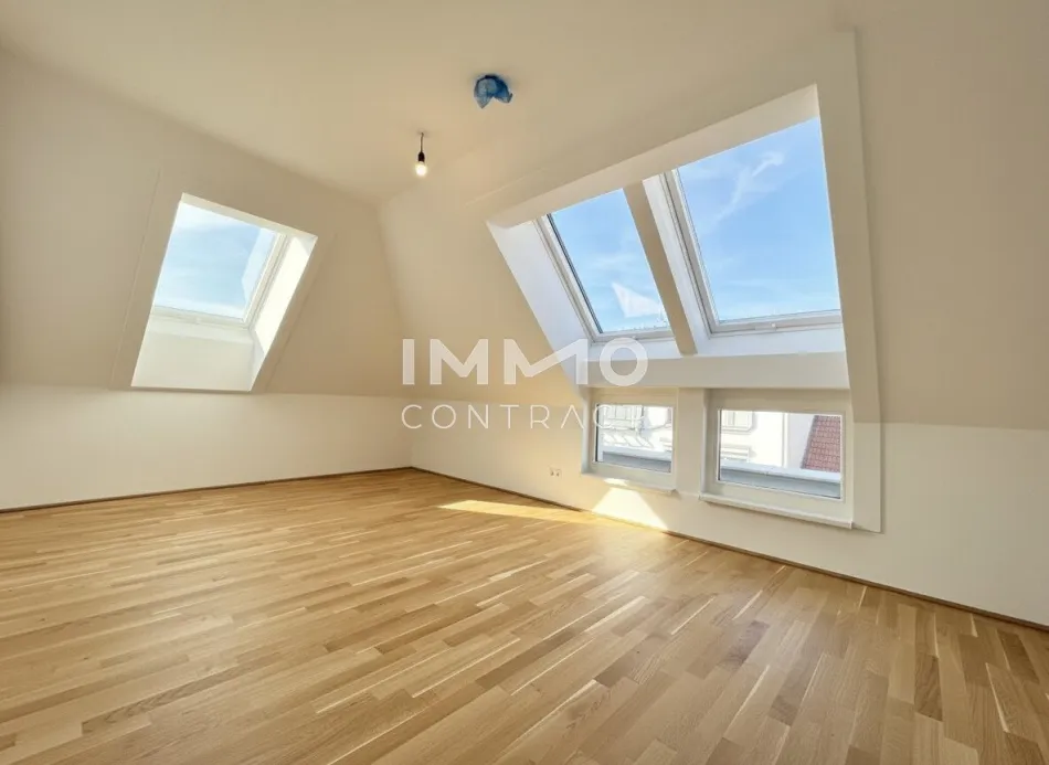 BEIM DONAUUFER: Klimatisierte 3-Zimmer-Dachgeschosswohnung mit sonnigem Glasbalkon - Bild