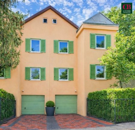Stylische Doppelhaushälfte mit Wintergarten, Terrasse und Gartenlounge