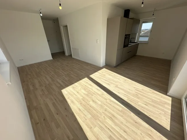 Neubau: Stilvolle Wohnung mit Balkon, Wärmepumpe & Lift - Erstbezug! - Bild