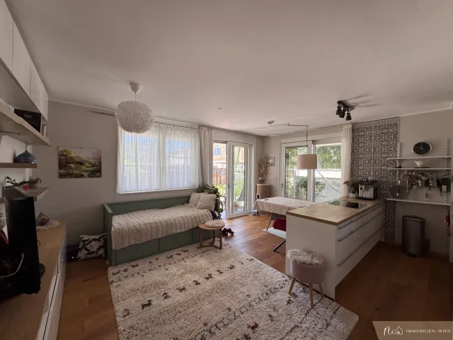 Garten-/Familienwohnung am Mühlwasser - 3 Zimmer - Tiefgaragenstellplatz - Einbauküche - 64 m2 Außenfläche - Titelbild