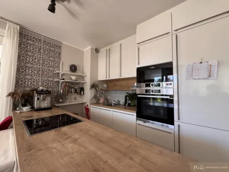 Garten-/Familienwohnung am Mühlwasser - 3 Zimmer - Tiefgaragenstellplatz - Einbauküche - 64 m2 Außenfläche