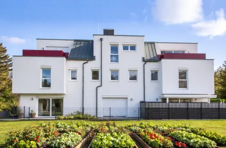 Ziegelmassiv-Reihenhaus in Grünruhelage mit City-Nähe | Niedrigenergie mit PV-Anlage & LWP | inkl. Parkplatz