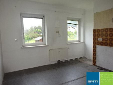 Sanierungsbedürftige Kleinwohnung mit Gartenanteil in Sankt Michael i.d.Obersteiermark
