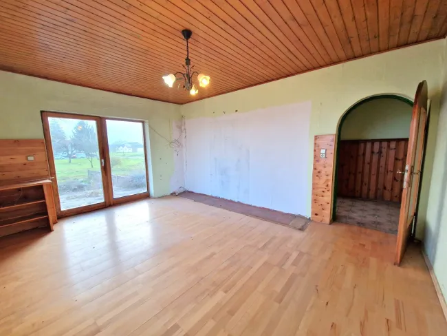 Wohnzimmer (EG) mit 19,7 m²