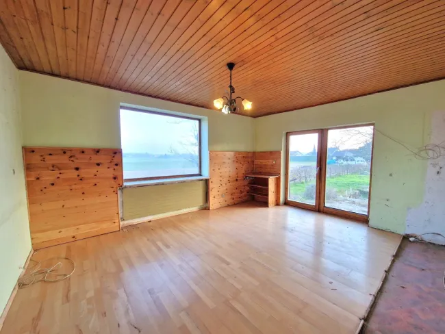 Wohnzimmer (EG) mit 19,7 m²