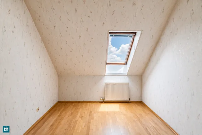 Schlafzimmer (W) OG.