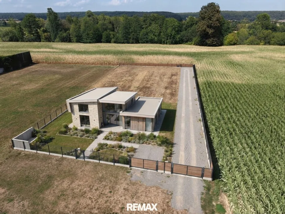 Baugrundstück mit Haus als Beispiel