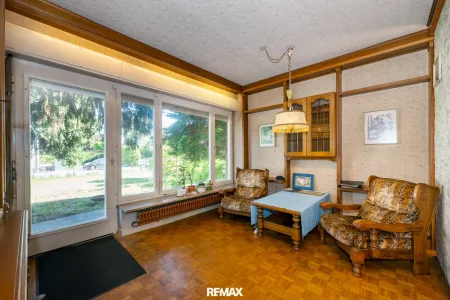 Wohnzimmer mit Zugang Terrasse EG