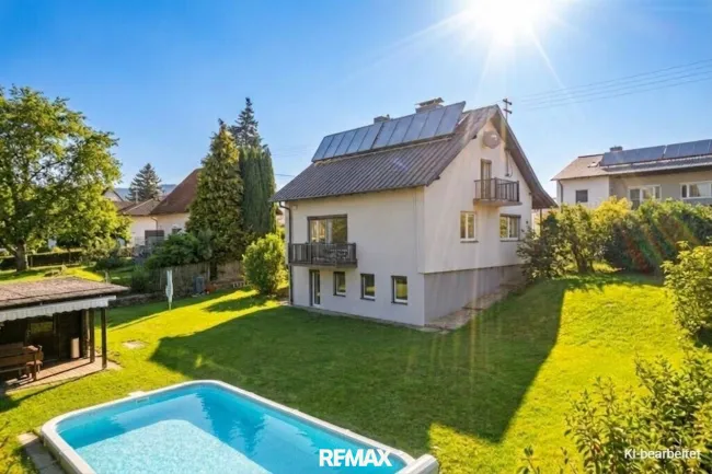 Familienparadies in Leonding – Einfamilienhaus mit Pool & sonnigem Garten - Titelbild