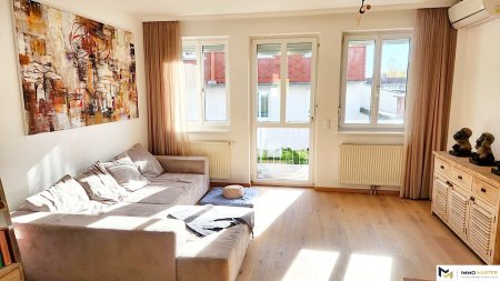 Großzügige Maisonette mit privater 48-m²-Dachterrasse und Panoramablick