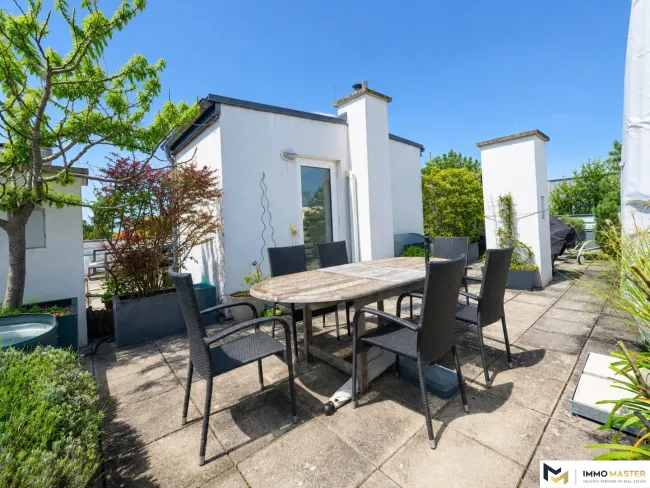 Großzügige Maisonette mit privater 48-m²-Dachterrasse und Panoramablick - Titelbild