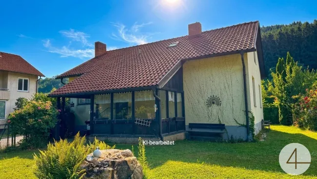Charmantes Einfamilienhaus in sonniger Ruhelage auf wunderschönem Eckgrundstück in Aspang - Titelbild