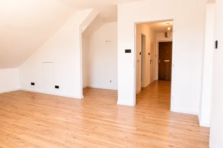 Kompakt wohnen, zentral leben – Dachgeschosswohnung mit Ausblick
