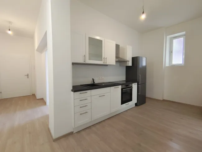 Moderne Wohnung in erstklassiger Lage am Hauptplatz mit Parkplatz - Titelbild