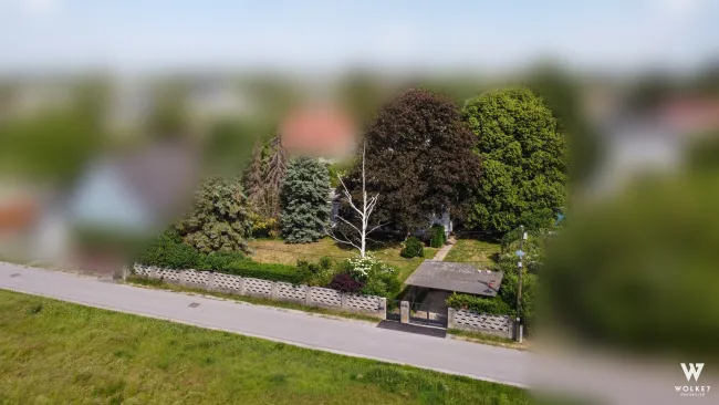 Großzügiges 1060m² Grundstück mit Altbestand | teilbar | Ruhelage | BK I, 6,5m, offen, 25% bebaubar - Bild