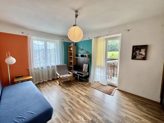 Wohnzimmer - mit Zugang Loggia OG