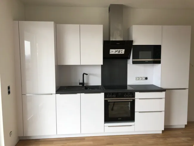 PERFEKTE GARTENWOHNUNG - TOP PREIS - TIEFGARAGE - Schnell Termin vereinbaren - BESICHTIGUNG AM 3.8. und 4.8.2026 - Bild