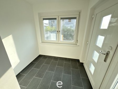 Heimeliges Eigenheim mit sonnigem Familiengarten in ruhiger Siedlungslage