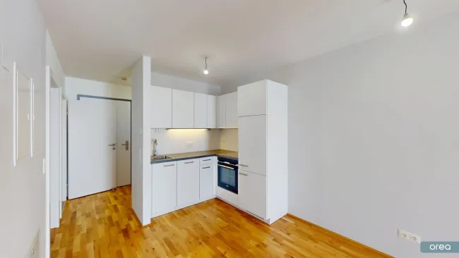 orea | 2-Zimmer-Wohnung mit Balkon in beliebter Grünlage von Donaustadt | Smart besichtigen · Online anmieten - Bild
