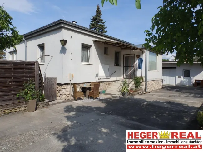 EINFAMILIENHAUS - NEBENGEBÄUDE mit GARAGE - ECKGRUNDSTÜCK 846m² - Titelbild