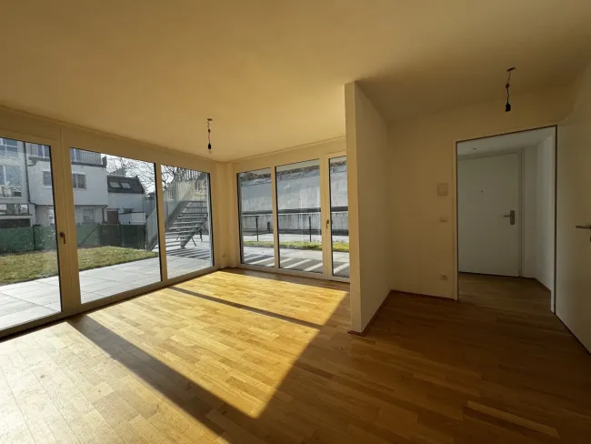 Schöne Familienwohnung mit Terrasse und großer Gartenfläche (T 1.3 / EG) - Bild