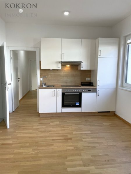 Top-aufgeteilte 3-Zi-Wohnung mit Fußbodenheizung/-Kühlung und Wohnküche