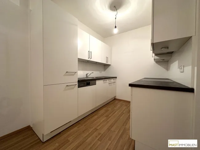 Dachgeschoss Wohnung! 2 Zimmer inkl. 22 m² Dachterrasse und EWE Küche in Spillern - Neubau Bj. 2019 - Bild