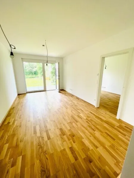 TRAUMHAFTE Neubauwohnung mit 2 Zimmern, Balkon und Tiefgaragenparkplatz Nähe Hauptplatz in Kalsdorf - Bild