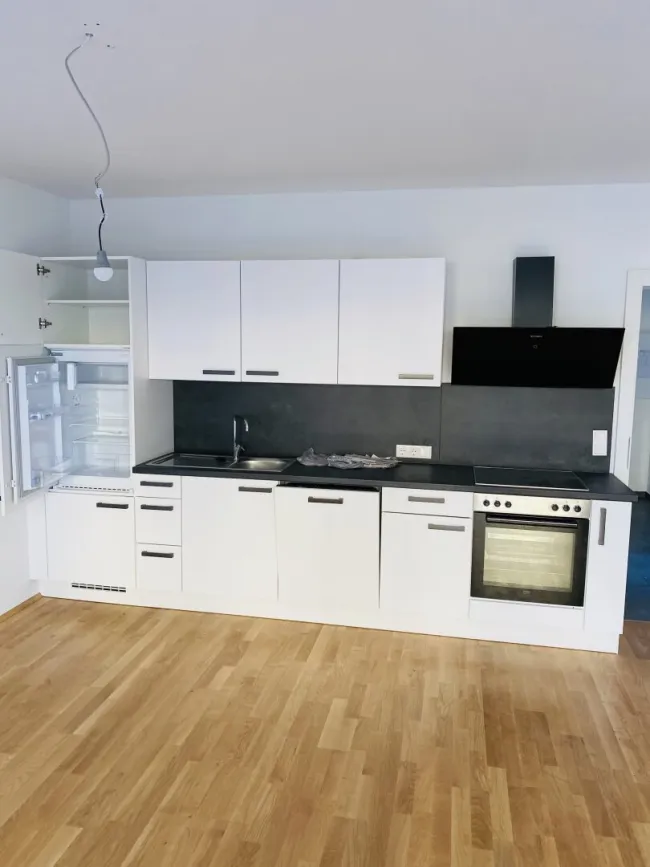 PROVISIONSFREIE 3-Zimmer-Neubauwohnung mit herrlichem Balkon, Morgensonne und Tiefgaragenparkplatz - Bild