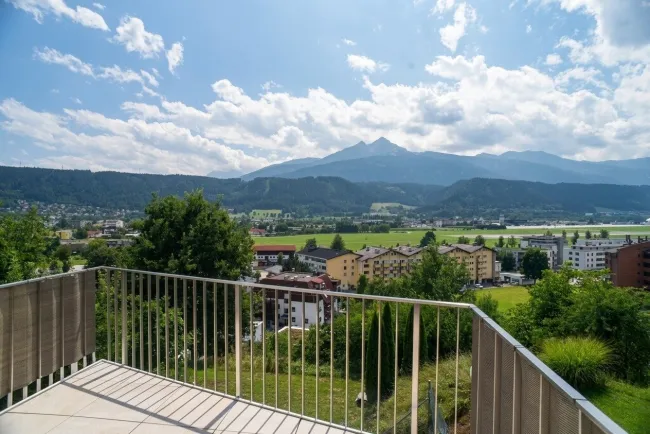 Exklusive Panoramawohnung in sonniger Ruhelage mit unverbaubarem Blick über Innsbruck und die Tiroler Bergwelt. Genießen Sie jeden Tag ein Panorama, das begeistert - Titelbild