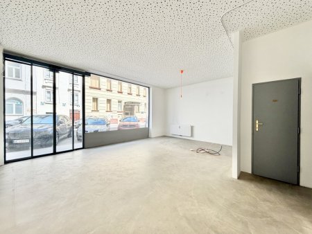 REPRÄSENTATIVES GESCHÄFTSLOKAL MIT GLASFRONT + LAGERHALLE NÄHE TABORSTRASSE ZU VERMIETEN