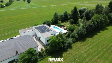 Wohnen und arbeiten in einzigartiger Kombination – moderner Bungalow mit Poollandschaft und Gewerbehalle