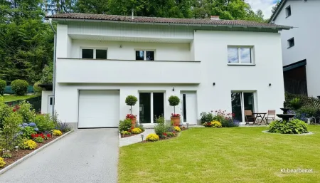 Charmantes Einfamilienhaus mit Terrasse, Balkon & Garage